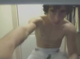 Muscular Twink Teases with Big Cock